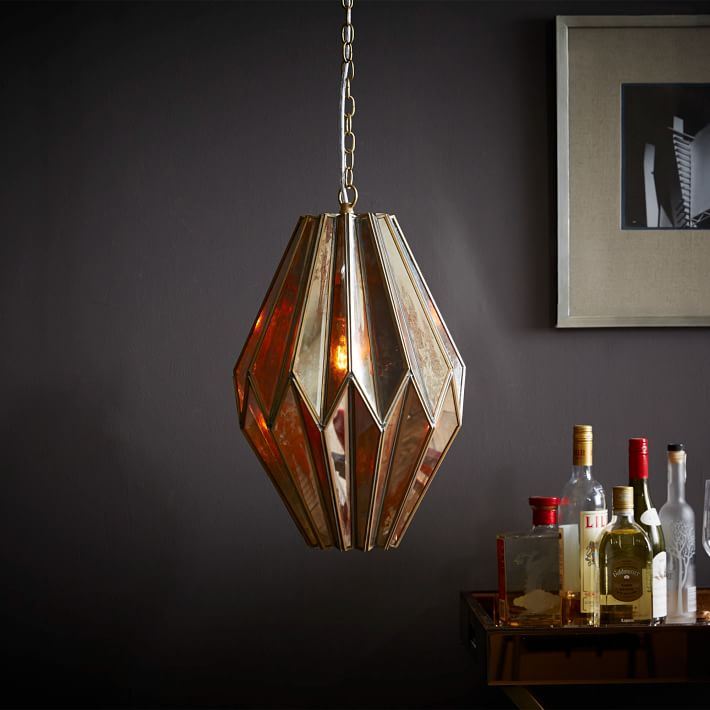 Mirrored brassy pendant light