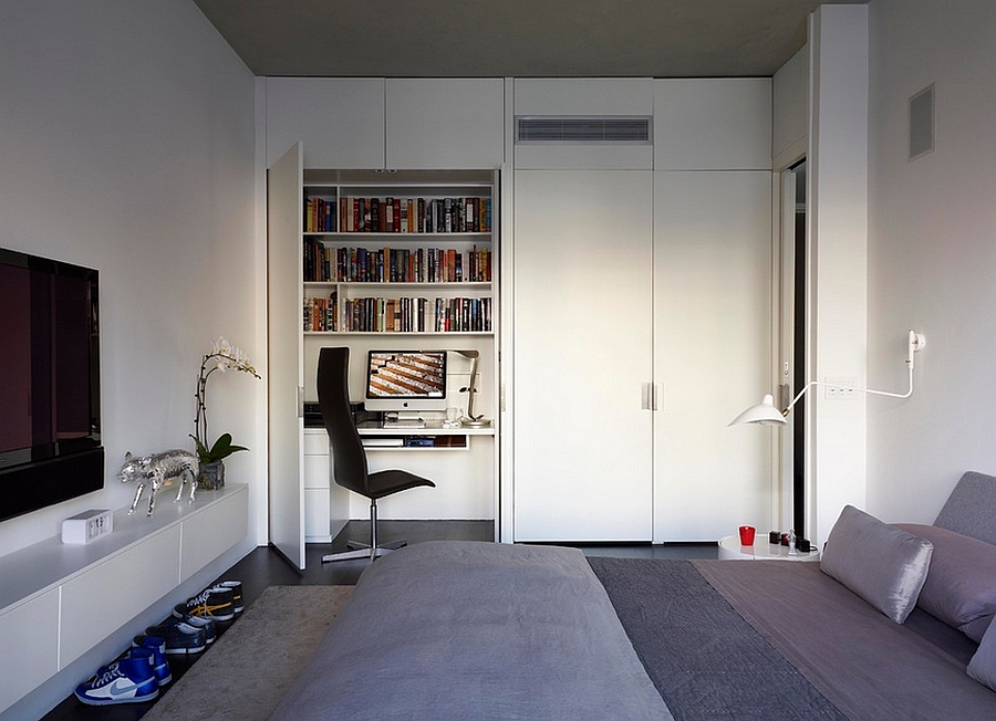 Modern bedroom in New York with a simple home office [Design: West Chin Architects]