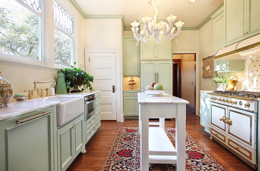 Narrow island offers additional countertop space in the small kitchen