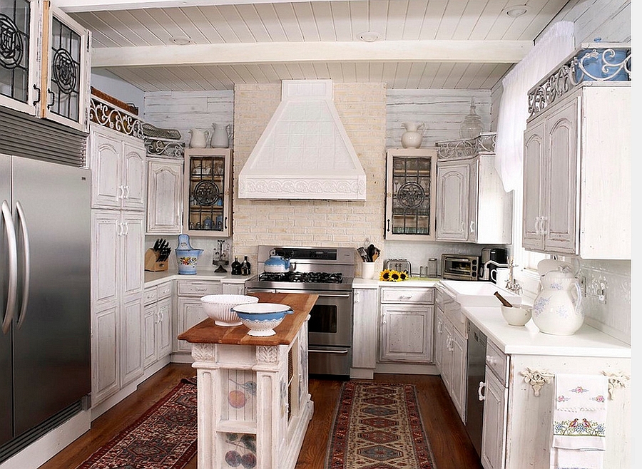 Narrow kitchen in white with a gorgeous island at its heart