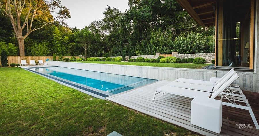 Natural greenery around the pool offers ample privacy