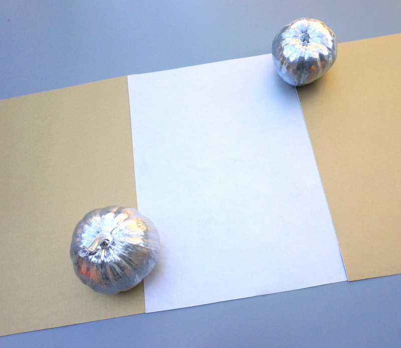 Silver and gold cardstock can transform into a table runner