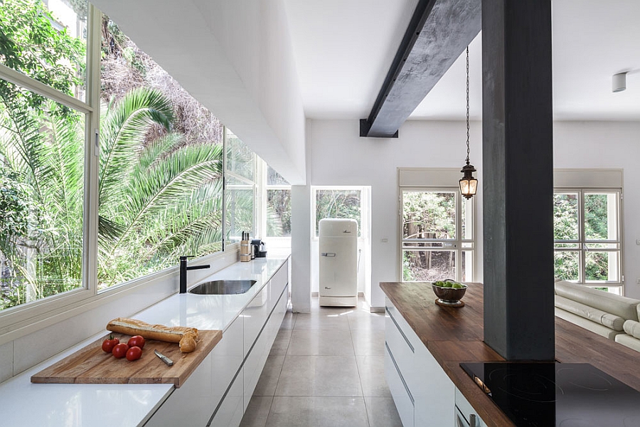 Sleek kitchen and dining space with an airy appeal