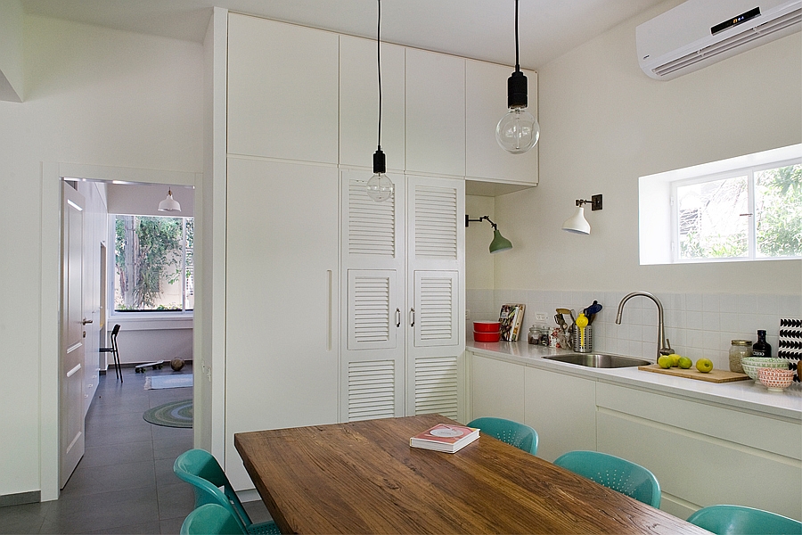 Small kitchen and dining area with smart shelves