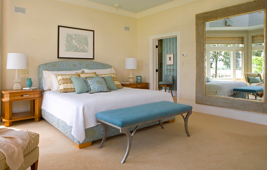 Soft yellow and cool blue give the room an inviting ambiance [From: Sroka Design]