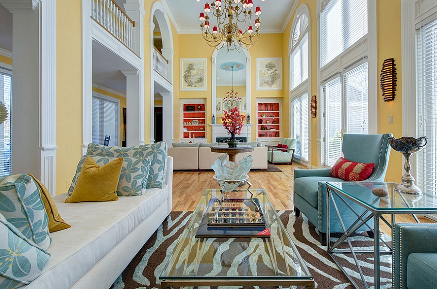 Spacious living room in yellow and blue with a hint of orange [Design: S&K Interiors]