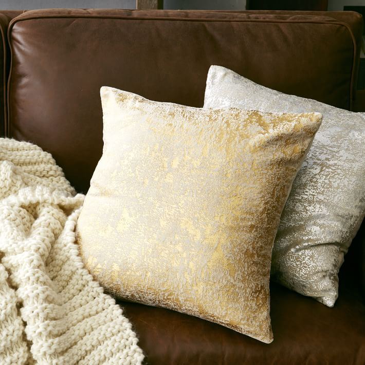 Textured metallic pillows