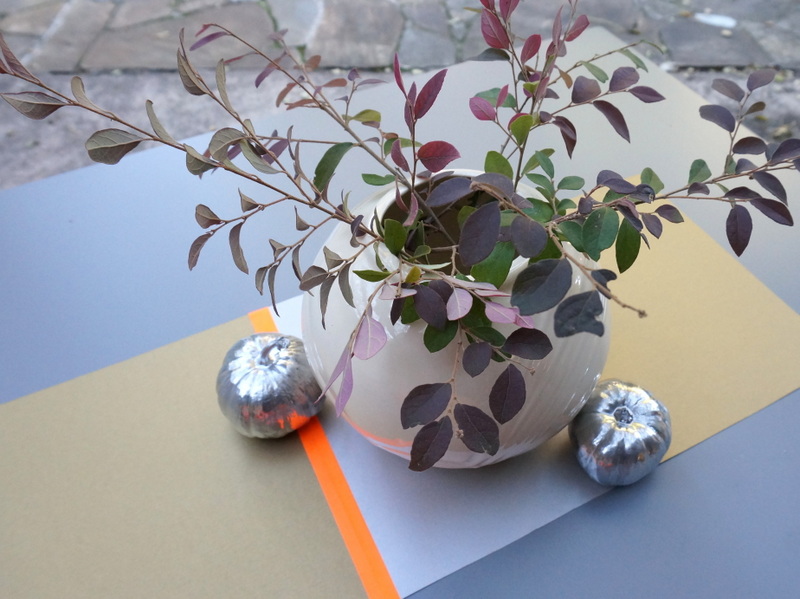 Thanksgiving centerpiece with spray painted pumpkins