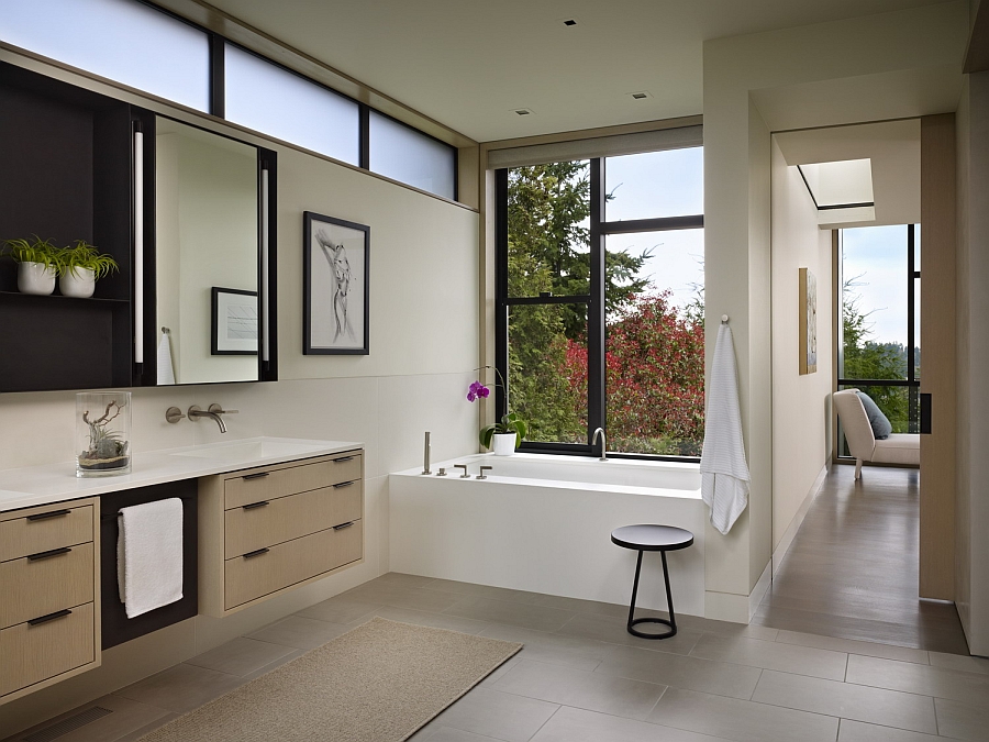 Window next to the bathtub gives the room an elegant ambiance