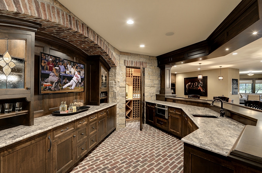 Wonderful use of space in the unique home bar creates the perfect man cave! [Design: Eskuche Design]