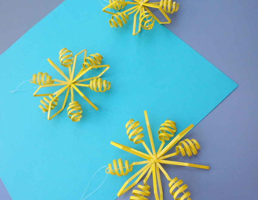Yellow metal Christmas ornaments from CB2