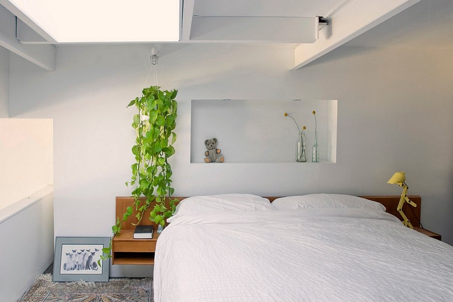 Bedroom with natural light and greenery [Photography: Heather Merenda]