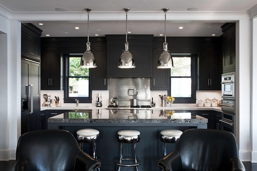 Black marble island adds a touch of luxury to the kitchen