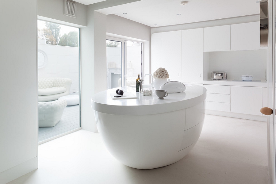 Contemporary kitchen island in white is ultra minimal