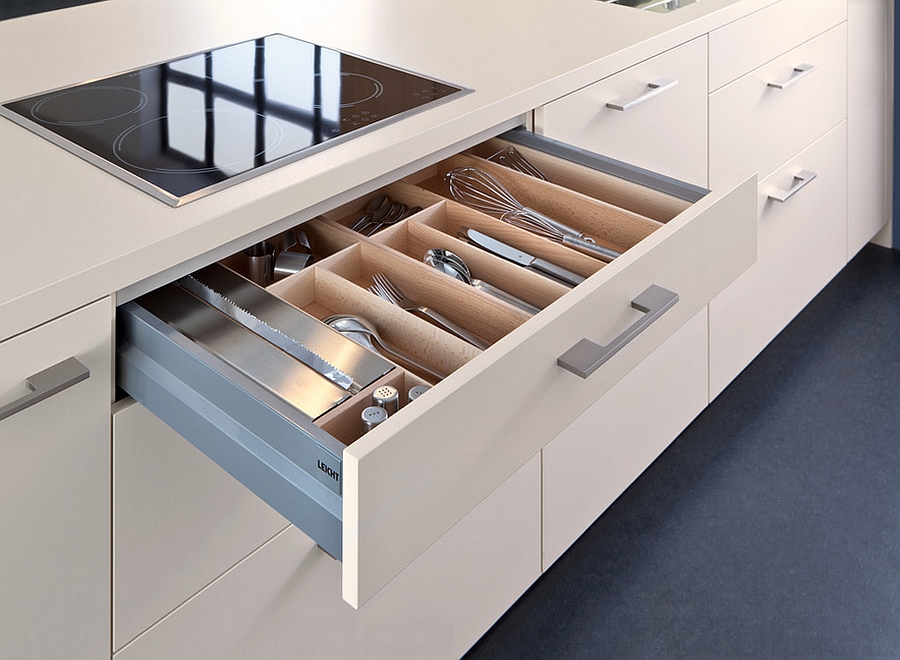 Contemporary kitchen island in white with smart cabinets