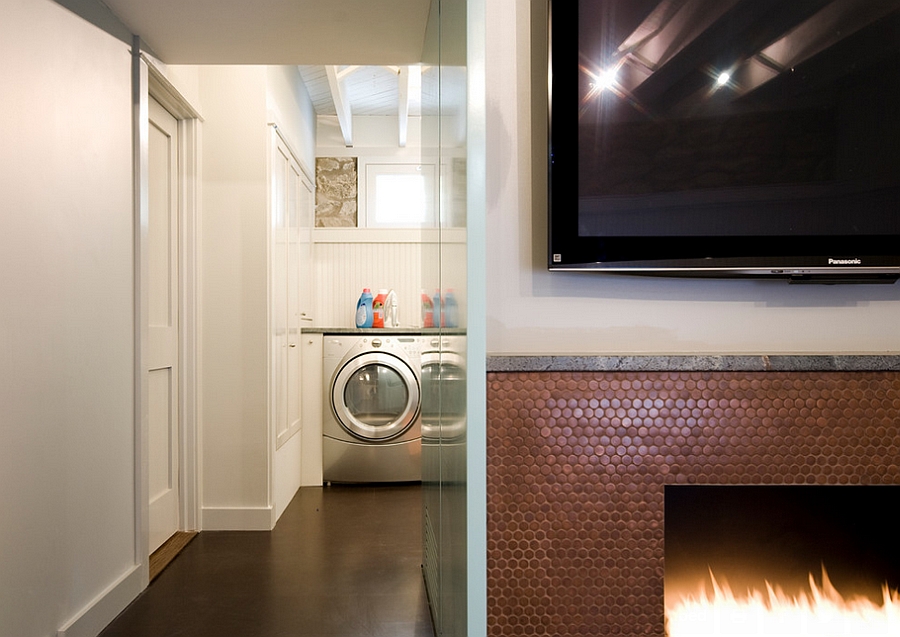 Copper penny tiles bring the fireplace alive with a metallic glint
