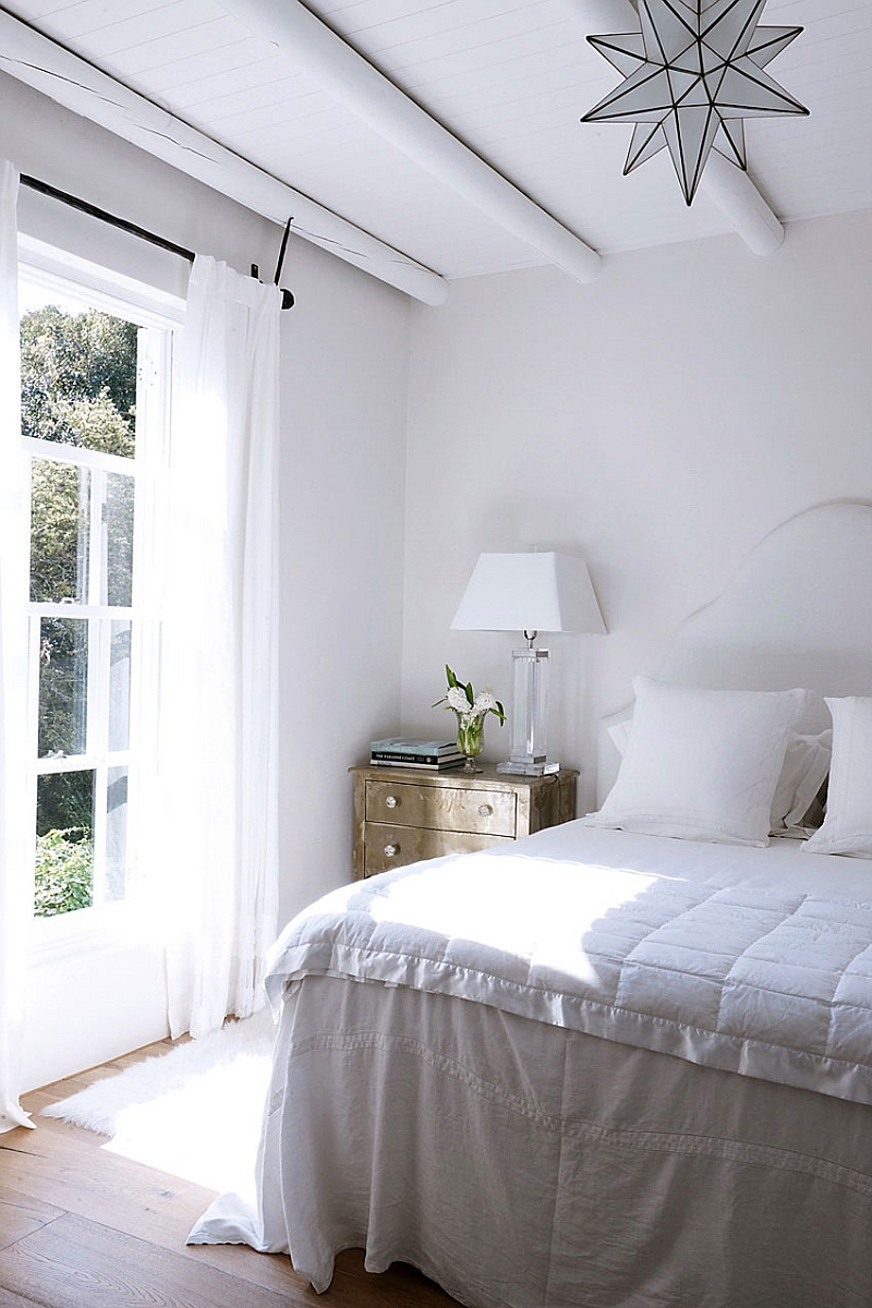 Cozy bedroom in white with ample natural ventilation