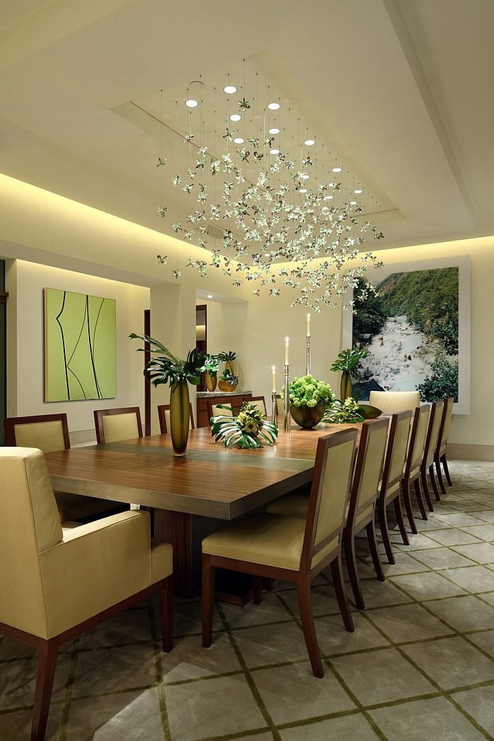 Custom lighting fixture adds to the appeal of the dining room [Design: David Phoenix Interior Design]