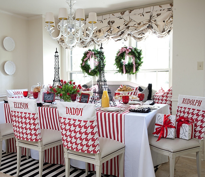 Custom made chair covers for the festive kitchen and dining space [Design: Tobi Fairley Interior Design]