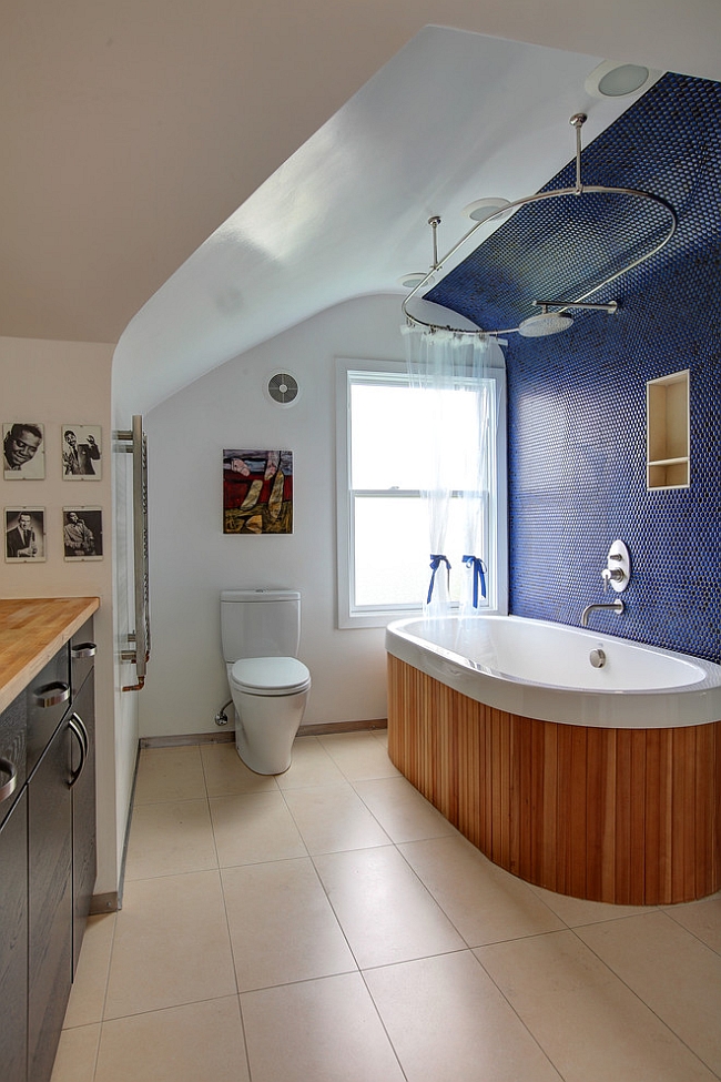 Dazzling accent wall in blue crafted using penny tiles [Design: Doon Architecture of the Hamptons]