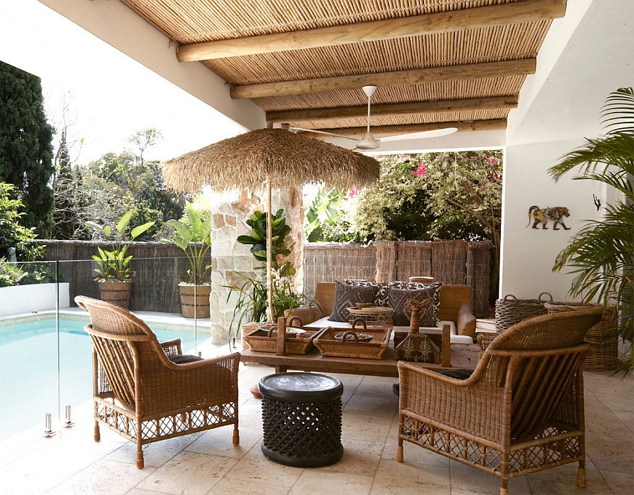 Decor in natural rattan gives the poolside deck a relaxed appeal