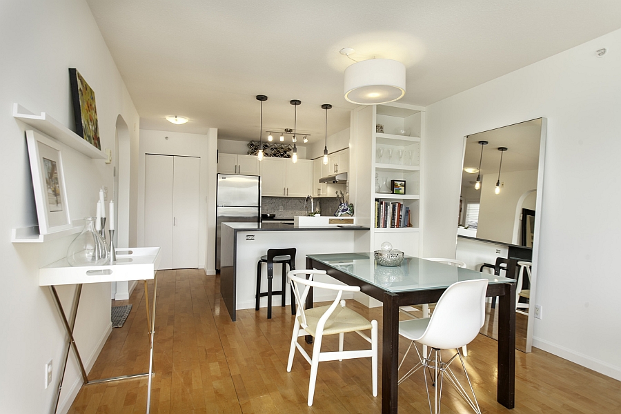 Eclectic blend of chairs at the dining table