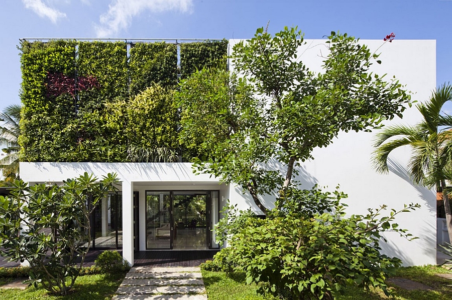 Entrance to the private vill clad in greenery