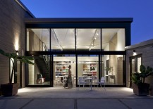 Expansive-glass-and-steel-unit-that-opens-up-into-the-backyard-patio-217x155