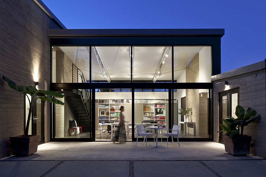 Expansive glass and steel unit that opens up into the backyard patio