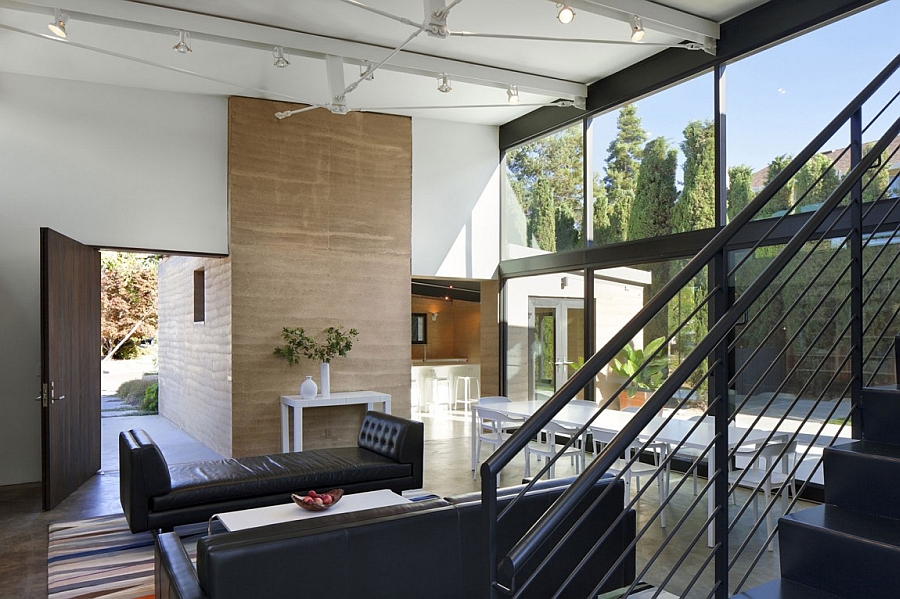 Exquisite use of black anchors the spacious living room