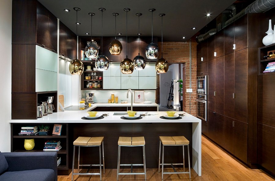 Fabulous use of gold and silver lighting fixtures in the kitchen