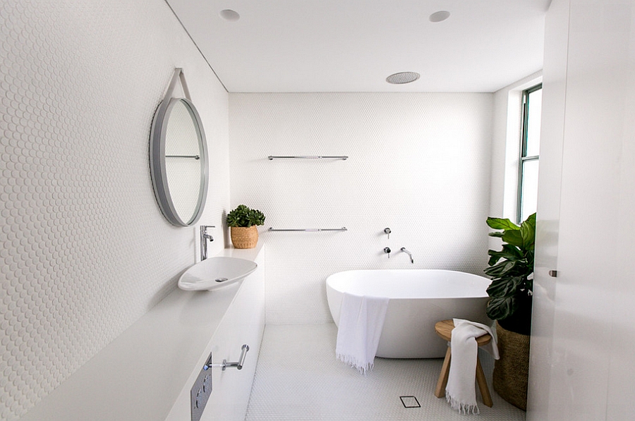 Fabulous white bathroom filled with penny tiles! [Design: C+M Studio]