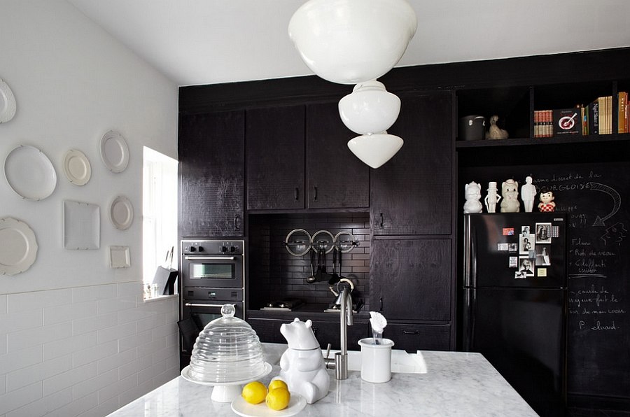 Give your kitchen a sophisticated dark backdrop [Design: Stephane Chamard]