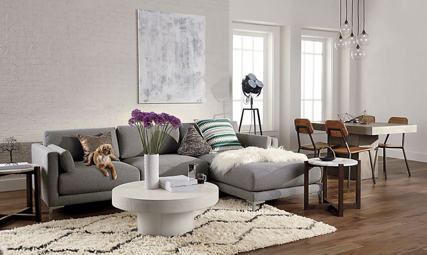 Gray sectional sofa in a modern eclectic space