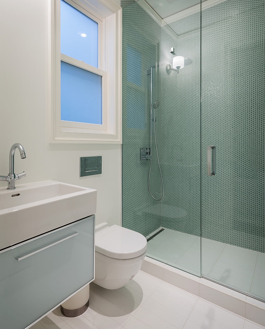 Green penny tiles for the smart shower area