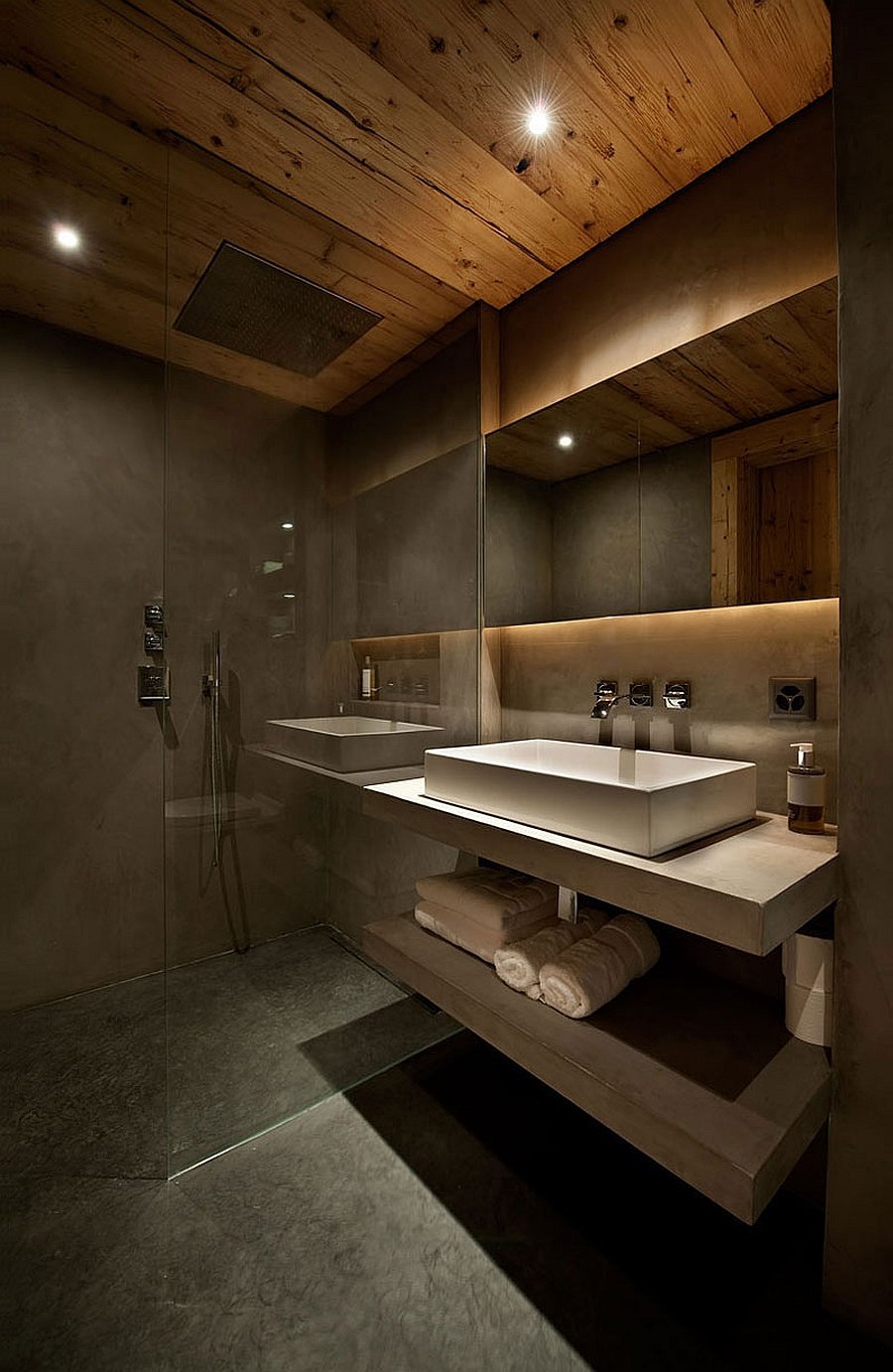 Grey tadelakt and white Turkish limestone shape the chalet bathroom