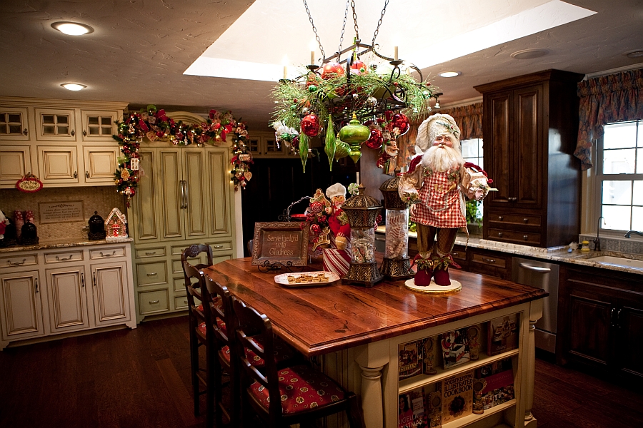 Kitchen island with Christmas ornaments and Santa figurine