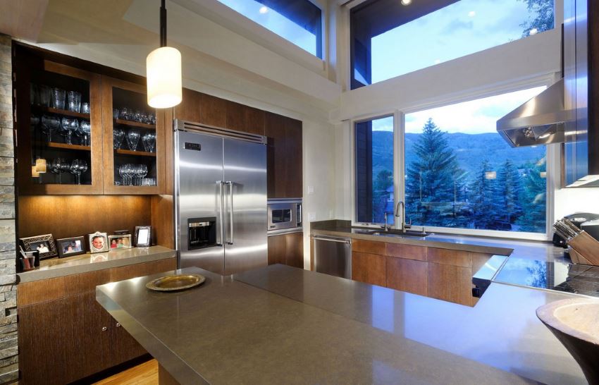 Kitchen with a forest and mountain view