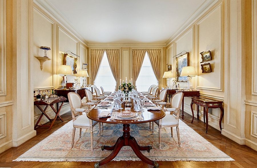 Lavish dining room has a lovely yellow aura