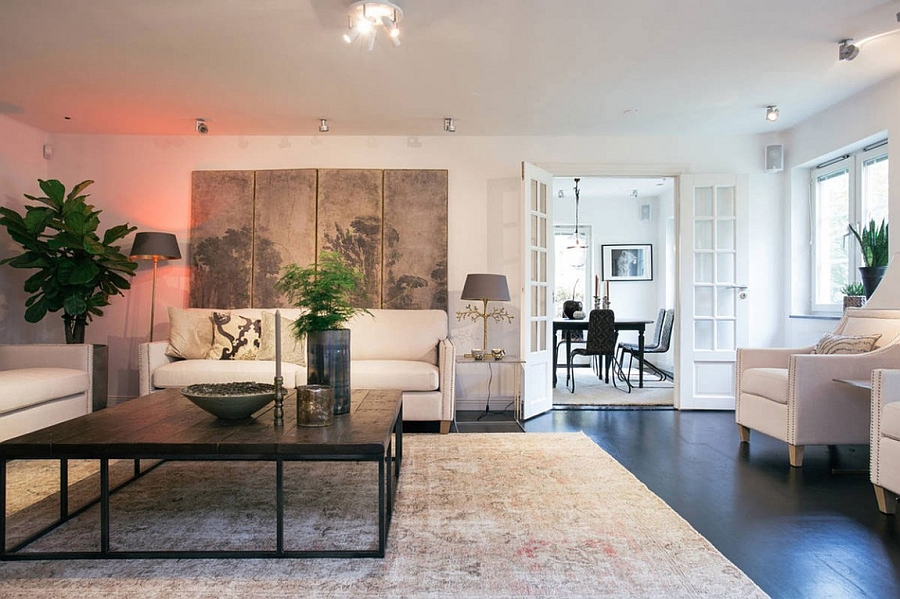 Living area of the apartment filled with plush decor