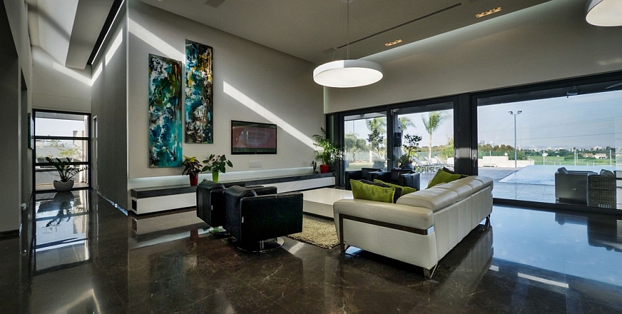 Living room connected with the outdoor deck through large sliding doors