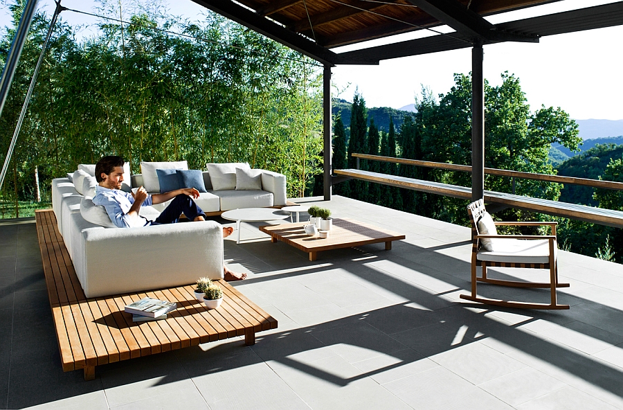 Minimal and gorgeous outdoor sofa with a teak base