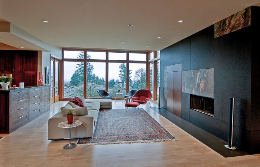 Modern living room with a view of tall trees