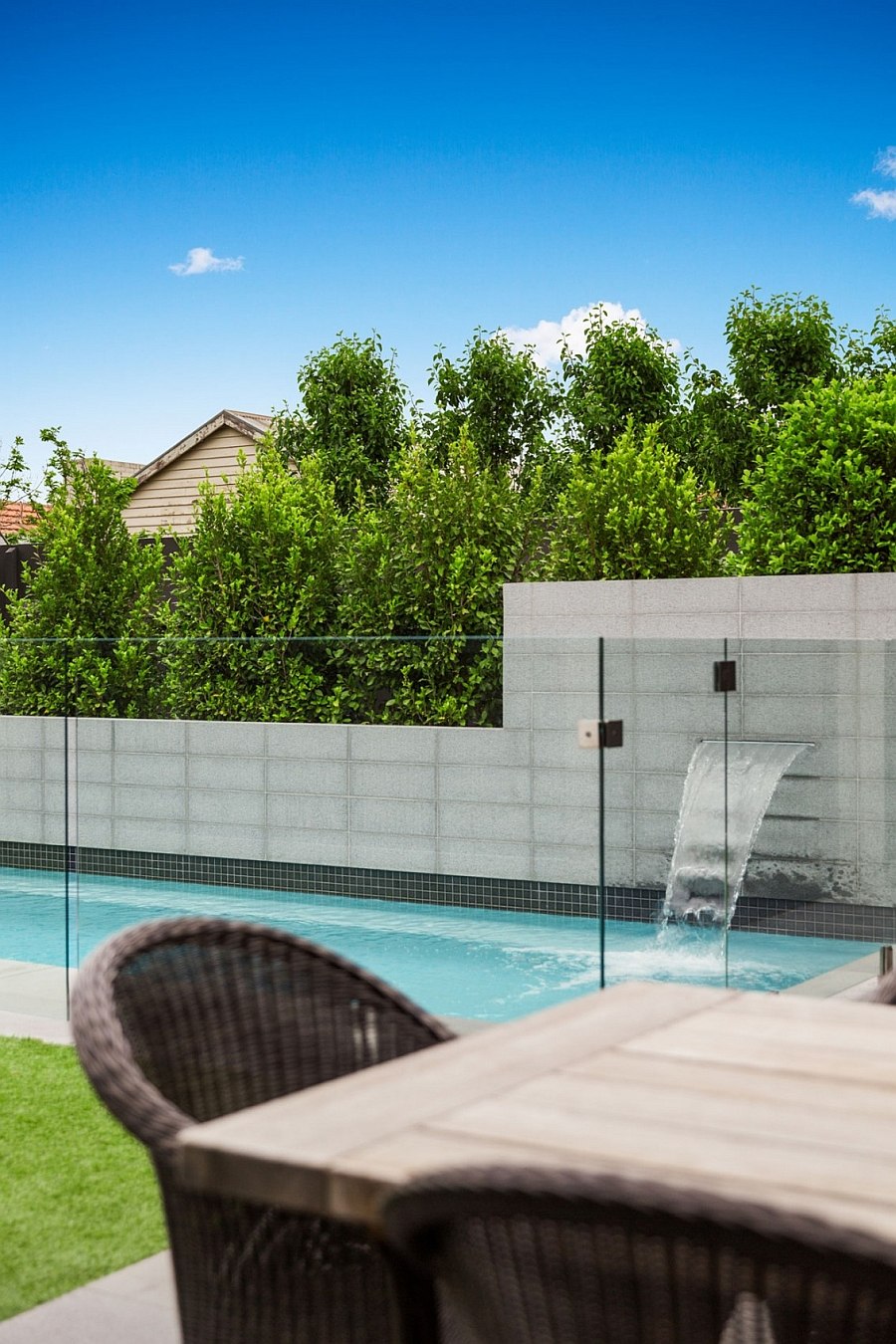 Outdoor pool and water feature for the modern home