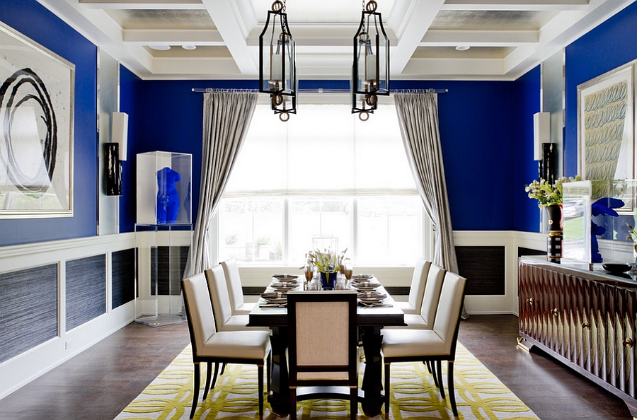 Patterned rug adds yellow to the dining room in blue