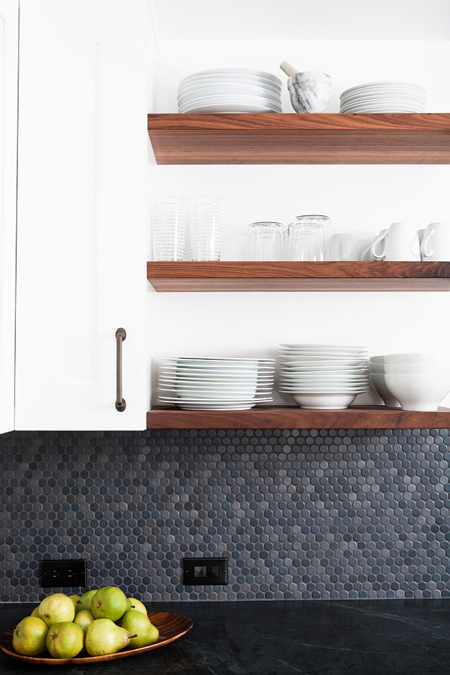 Penny tiles help recreate the aura of a 50s kitchen [Design: Regan Baker Design]