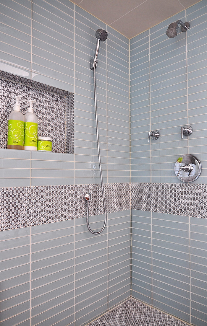 Penny tiles used to create an accent fetaure in the contemporary bathroom