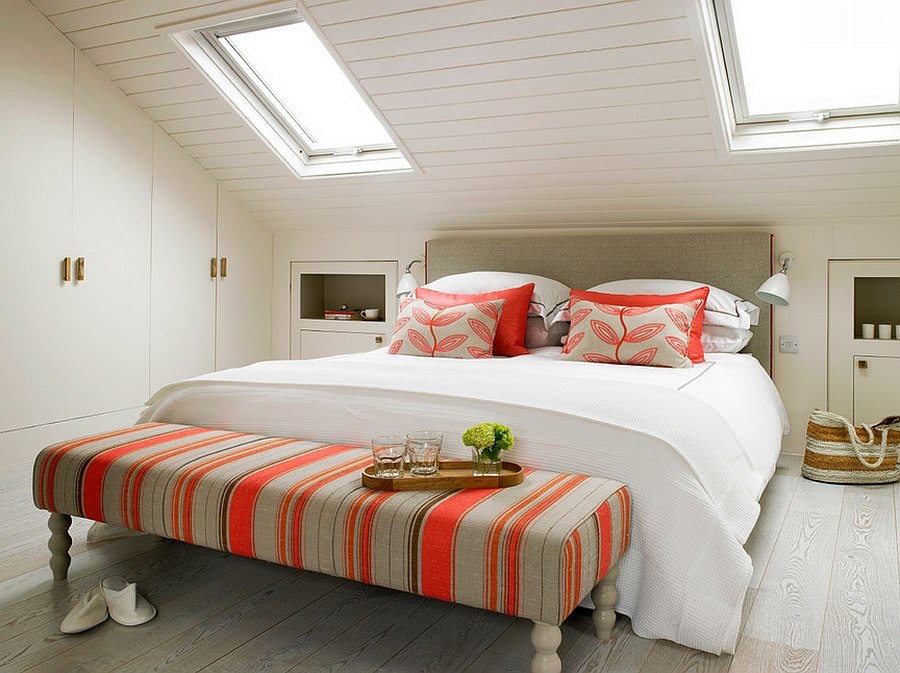 Pops of coral bring breezy charm to the beautiful bedroom