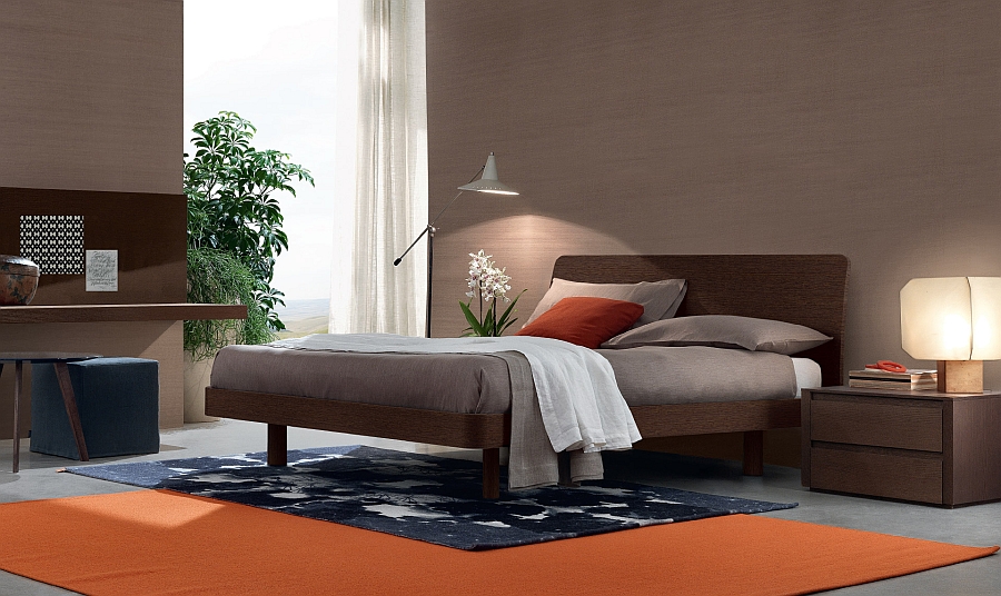 Pops of orange enliven the bedroom