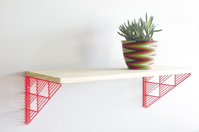 Red geometric wall brackets from Bend